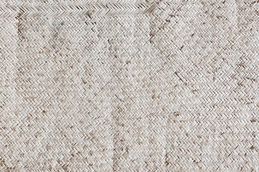 Old reed mat pattern in light brown color, useful for background and wallpaper.