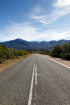 The road - The Swartberg mountains are a mountain range in the Western Cape province of South Africa. It is composed of two main mountain chains running roughly east-west along the northern edge of the semi-arid Little Karoo.