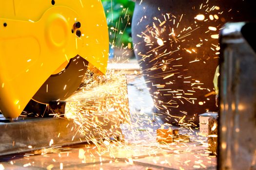 Metalworking / close up of cutting metal, Industrial Worker