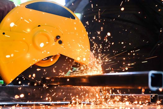 Metalworking / close up of cutting metal, Industrial Worker