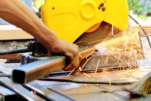 Metalworking / close up of cutting metal, Industrial Worker