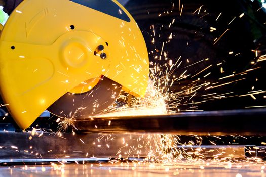 Metalworking / close up of cutting metal, Industrial Worker