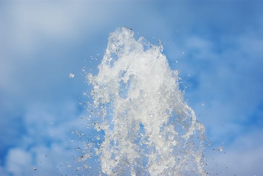 blue water splash crystal clear droplets