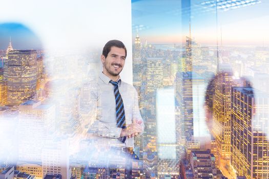 Relaxed cheerful team leader and business owner leading informal in-house business meeting. Business and entrepreneurship concept. New Your city lights reflection in window glass.