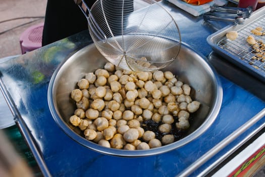 Cooking, Deep frying fishball in the pan in hot oil. street food in Thailand