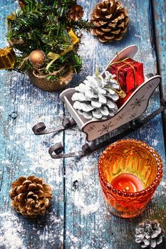 Symbolic sleigh of Santa Claus and Christmas decorations