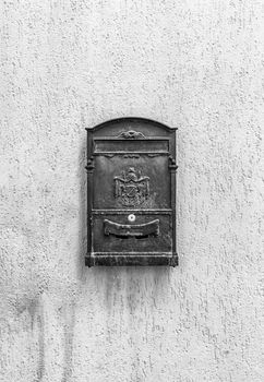 Old mailbox with ancient logo and copy space