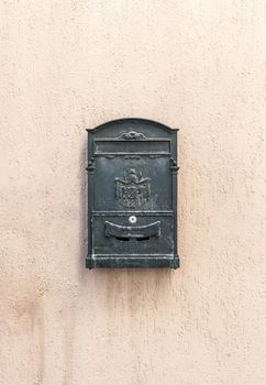 Old mailbox with ancient logo and copy space