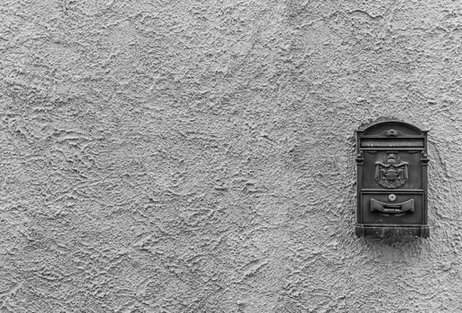 Old mailbox with ancient logo and copy space