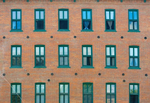 apartments in old shop brick and windows wall facade architecture