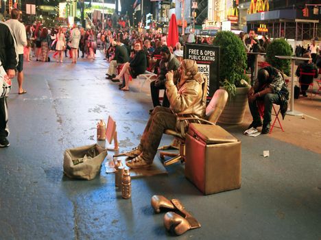 New York, USA - May 16, 2013: Times Square, featured with Broadway Theaters and huge number of LED signs, is a symbol of New York City and the United States, May 16, 2013 in Manhattan, New York City