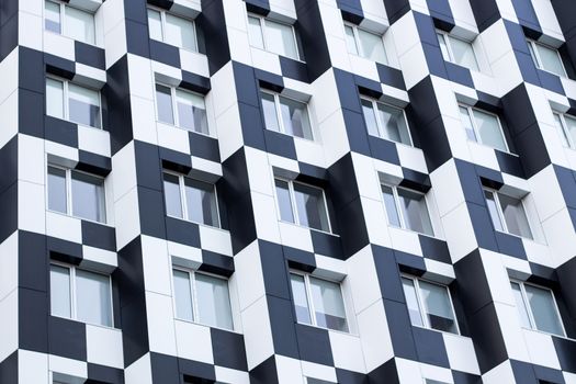 Black and white minimalistic bauhaus office building of business center - chequered background