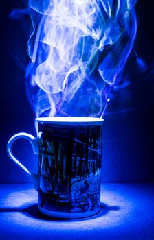 A portrait of a mug with smoke inside