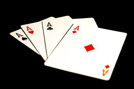 Playing cards in a black background