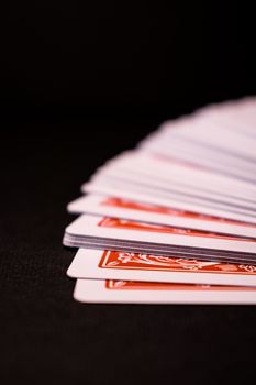 Playing cards in a black background