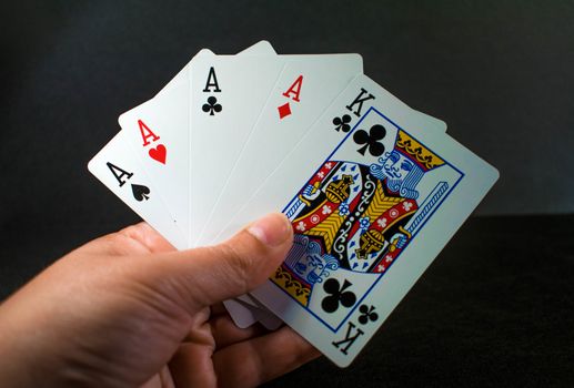 Playing cards in a black background
