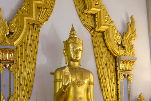 Thailand - August 31, 2016: Golden Buddha statue at Wat Sothorn, Chachoengsao Thailand