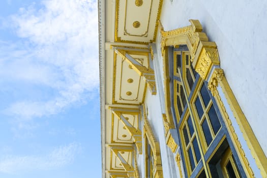 Detail of roof temple' construction with clear sky background at Wat Sothorn, Chachoengsao Thailand