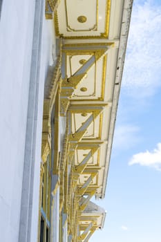 Detail of roof temple' construction with clear sky background at Wat Sothorn, Chachoengsao Thailand