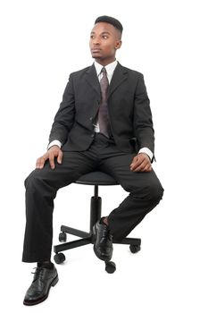 successful businessman suit and tie seated on black chair on white background