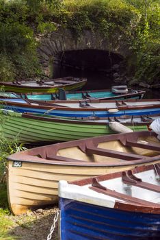 rowing boats moored at ross castle in killarney county kerry ireland