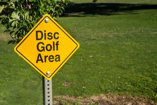 Sign showing that this is a disc golf area