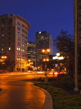 Evening Winnipeg, Main Street, downtown, Canada. Vertical frame.