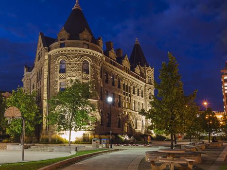 Evening Winnipeg, Canada. University building, similar to the ancient castle. Artificial lighting.