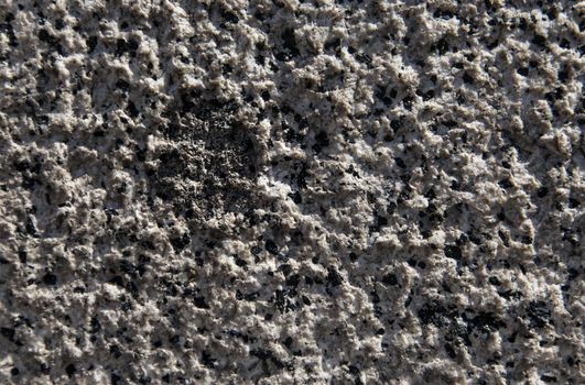 Close-up of an old granite stone rough pattern. Horizontal image.