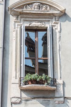 old window in the house with flowers