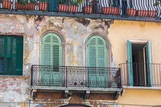 exterior of an old building windows and balcony
