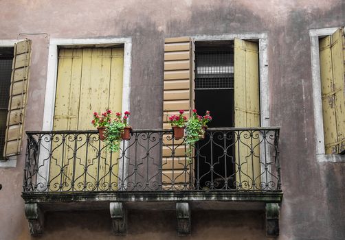 exterior of an old building windows and balcony