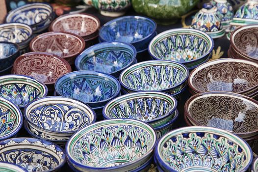 Traditional ceramic dishware in a street market, Uzbekistan