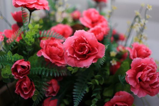 Red Artificial Rose flower in basket