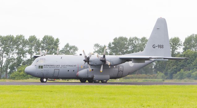 LEEUWARDEN, THE NETHERLANDS - JUNE 10, 2016: Dutch Air Force Lockheed C-130H-30 Hercules (L-382) [G-273] during a demonstration at the Royal Netherlands Air Force Days on june 10, Leeuwarden, The Netherlands