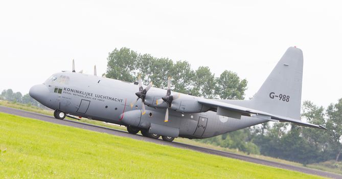 LEEUWARDEN, THE NETHERLANDS - JUNE 10, 2016: Dutch Air Force Lockheed C-130H-30 Hercules (L-382) [G-273] during a demonstration at the Royal Netherlands Air Force Days on june 10, Leeuwarden, The Netherlands