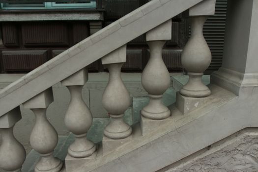 old stone balusters staircase handrail close-up