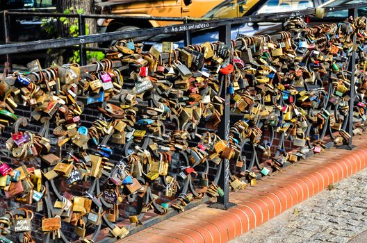 Padlocks of memories of love  hanging on the bridge next to the other locks in Gdansk-Poland