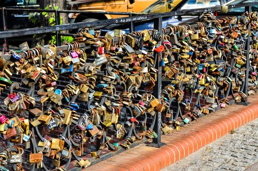 Padlocks of memories of love  hanging on the bridge next to the other locks in Gdansk-Poland