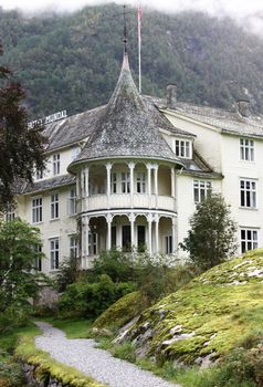 Mundal hotel in Fjærland. The hotel is located at the end of the Fjærlandsfjord in Sogn og Fjordane. The hotel was built in 1891 and was among the destinations of early tourism in Norway. One of the famous people who stayed at the was Kaiser Wilhelm II of Germany.