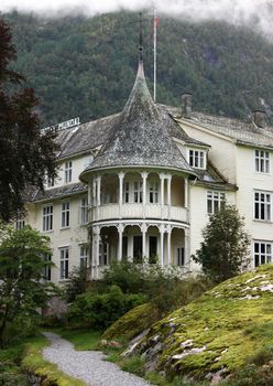Mundal hotel in Fjærland. The hotel is located at the end of the Fjærlandsfjord in Sogn og Fjordane. The hotel was built in 1891 and was among the destinations of early tourism in Norway. One of the famous people who stayed at the was Kaiser Wilhelm II of Germany.