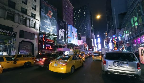 NEW YORK CITY, USA-OCTOBER 4:Times Square, featured with Broadway Theaters, Sightseeing Buses, Taxi Cabs and animated LED signs, is a symbol of New York City and the United States. Taken in Manhattan, New York City on October 4, 2014