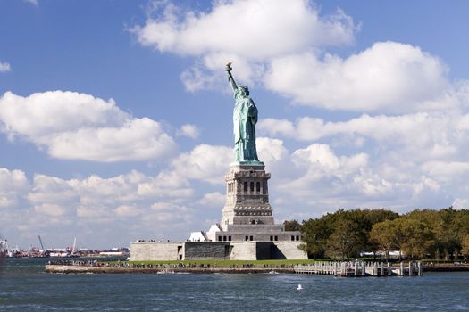 USA, NEW YORK, OCTOBER 8, 2014: Statue of Liberty at New York City is given the USA by France in 1885, standing at Liberty Island at Hudson river in New York.