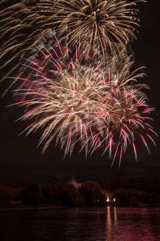 Beautiful night view and bright fireworks in Moscow sky