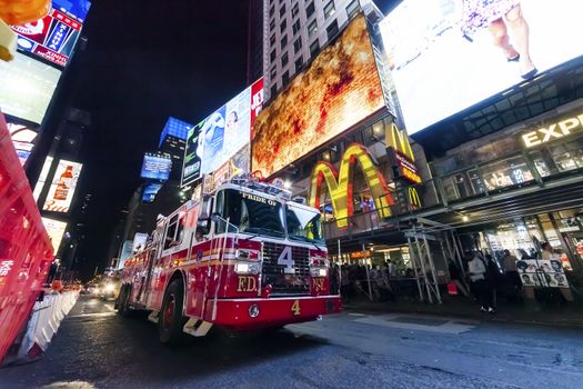 NEW YORK CITY, USA-OCTOBER 4:Times Square, The truck of New York Fire Department, is a symbol of New York City and the United States. Taken in Manhattan, New York City on October 4, 2014