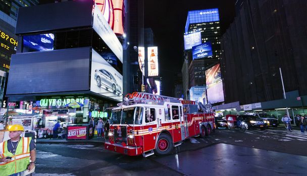 NEW YORK CITY, USA-OCTOBER 4:Times Square, The truck of New York Fire Department, is a symbol of New York City and the United States. Taken in Manhattan, New York City on October 4, 2014