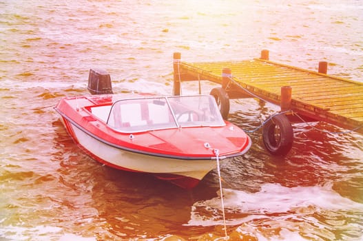 An image of boat moored in the harbor