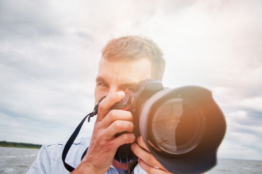 An image of nature photographer takes pictures