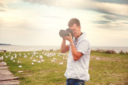 An image of nature photographer takes pictures