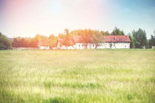 An image of house located in the meadow